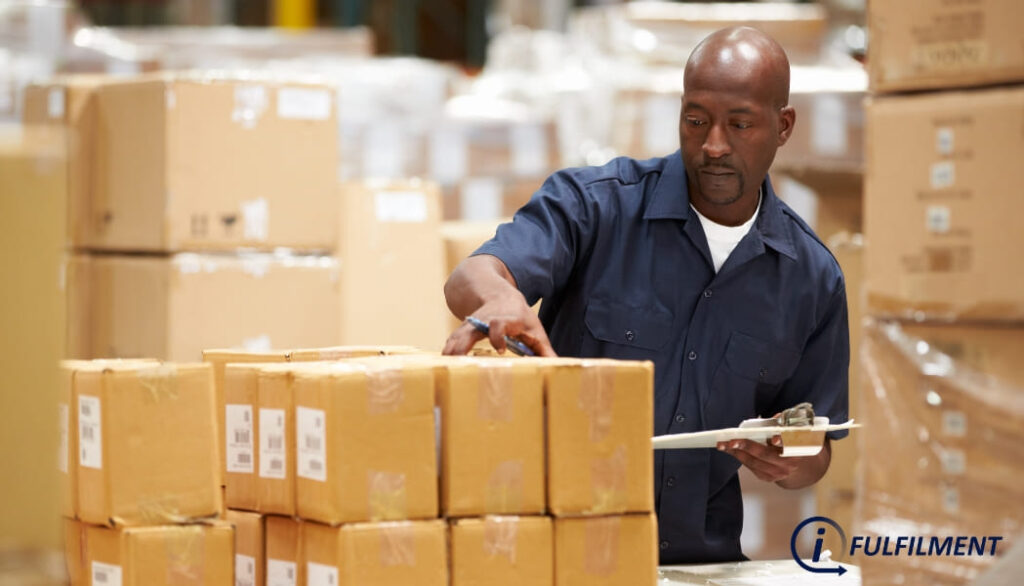 Worker in Warehouse Preparing Goods for Dispatch